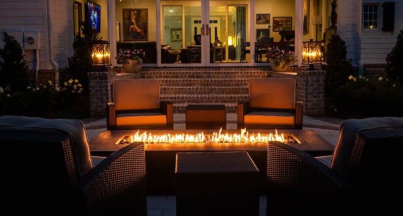 A beautiful outdoor fire place built by R&R Landscaping