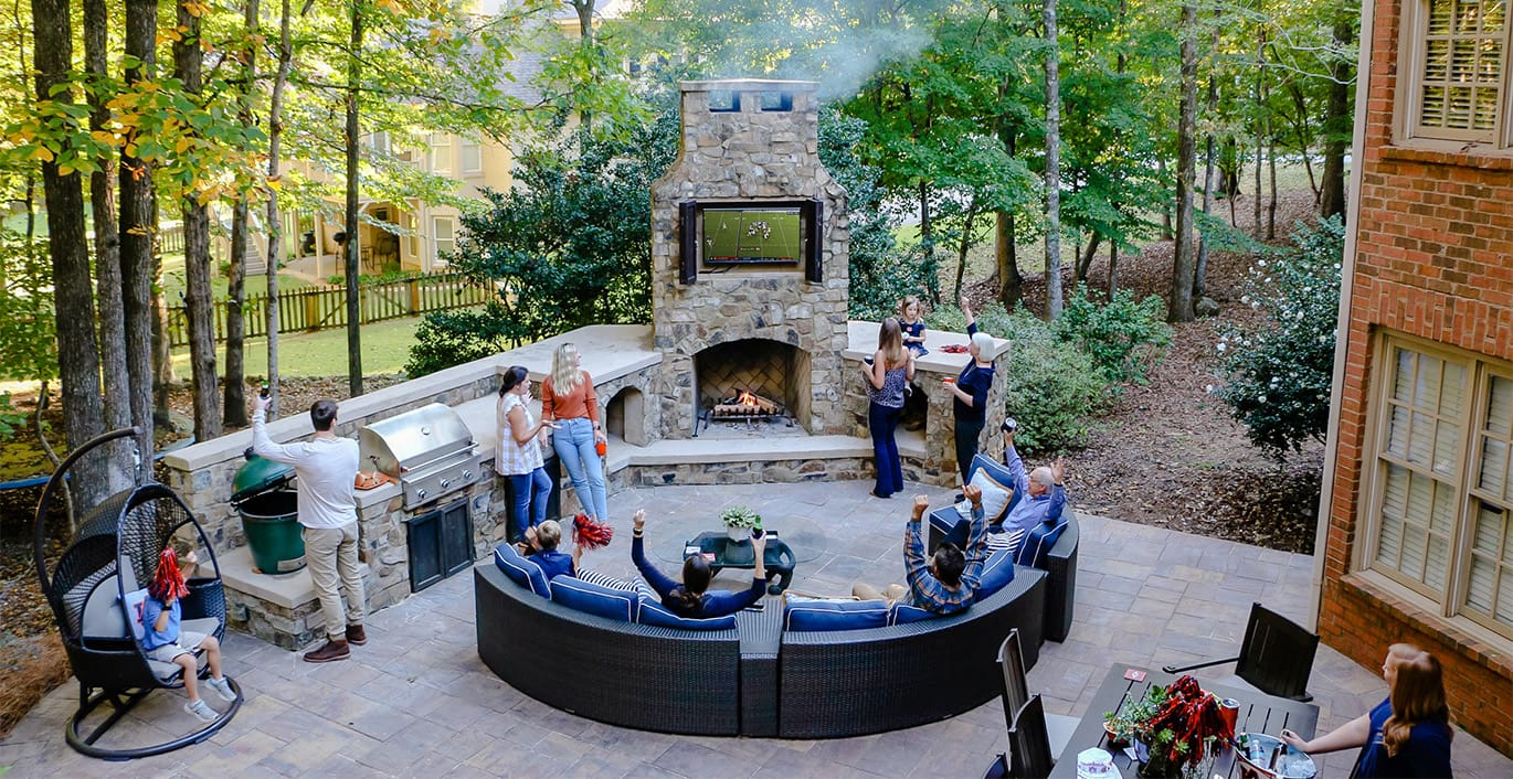 R&R Landscaping A beautiful outdoor kitchen and sitting area perfect for tailgating at home. This project was designed and built by R&R Landscaping