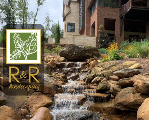 A beautiful sloped backyard transformation and pond installation, complete with natural rock creek. This project was designed and installed by R&R Landscaping.